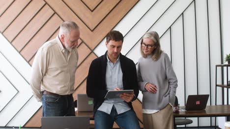 male teacher and students in classroom