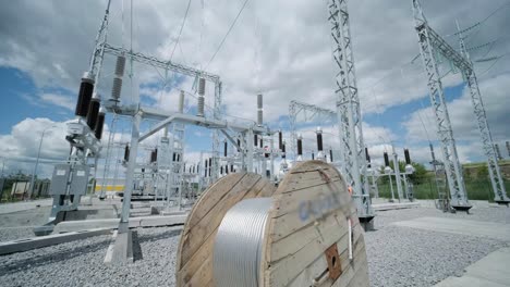 construction of a transformer substation. electrical engineer control wiring electric power on steel tower, electric construction and maintenance services throughout, electric power transmission infrastructure, highest voltage transmission