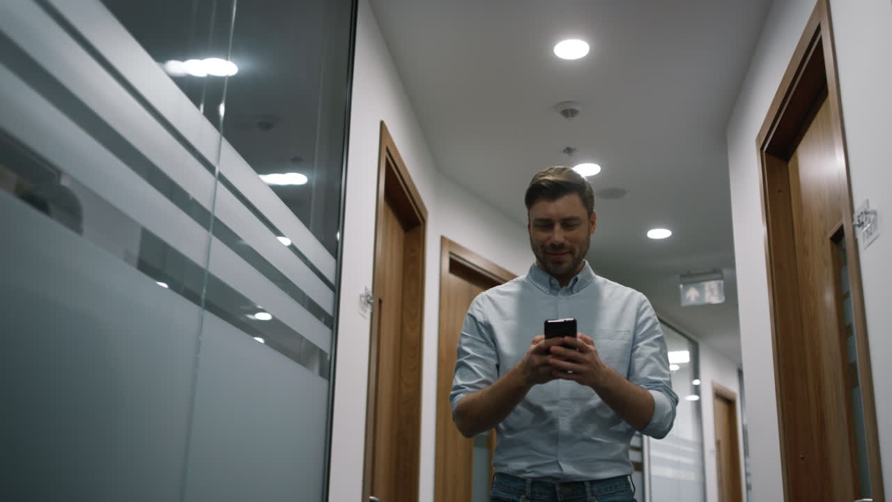 Confident business man talking on smartphone