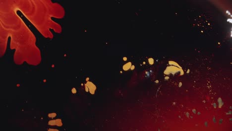 toma macro de patrones líquidos en tonos de rojo y marrón