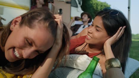 young friends spending time at the camping in the sun.