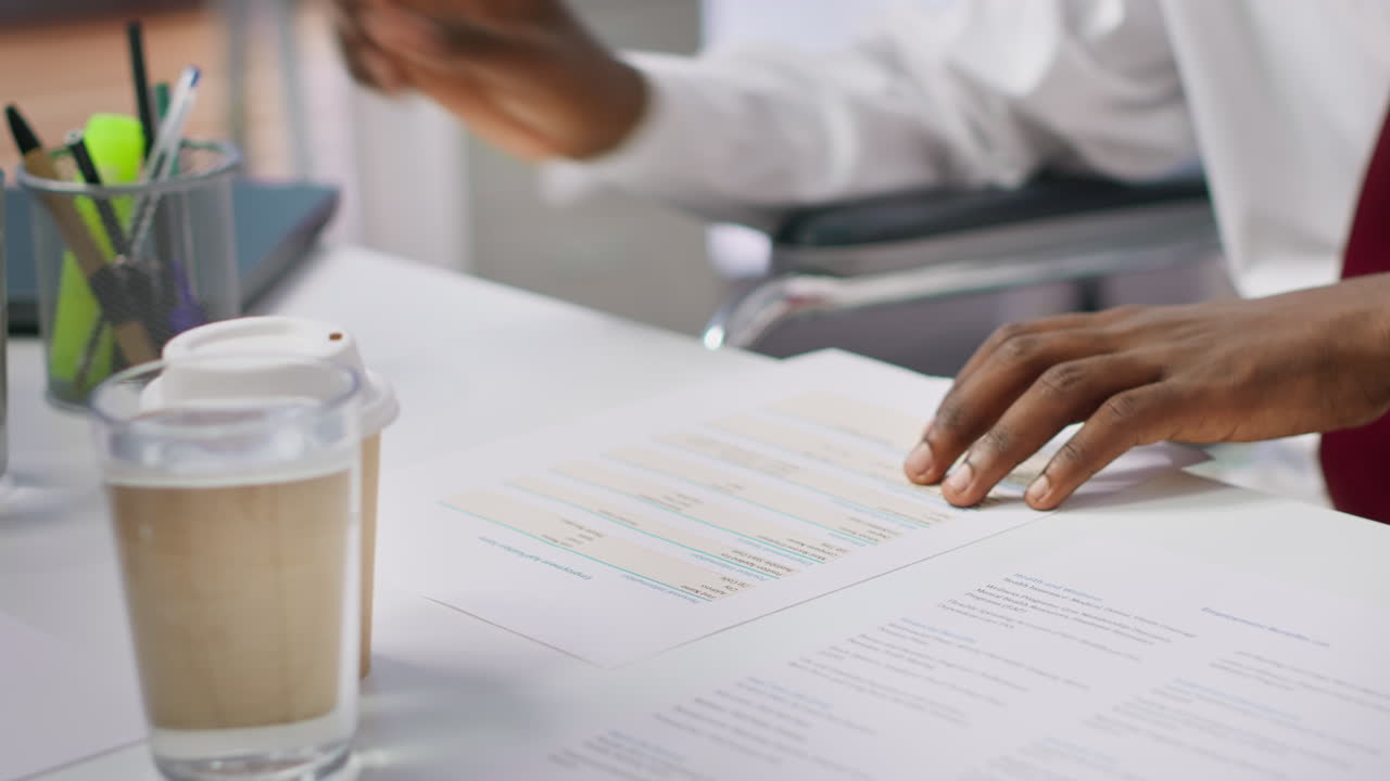 Job candidate with disability filling in the application form for the interview