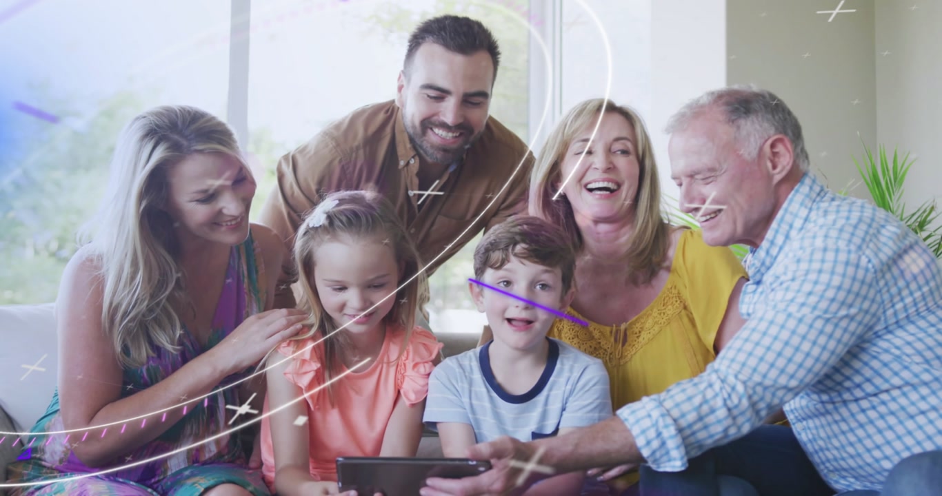 Girl holding tablet sharing family leaning in grandpa guiding tablet as tech overlays sweeping