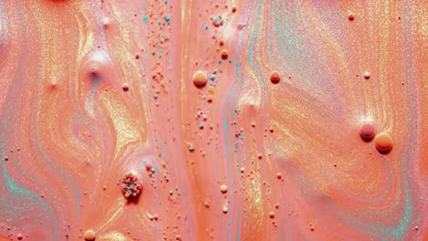 abstract fluid art with glitter and bubbles