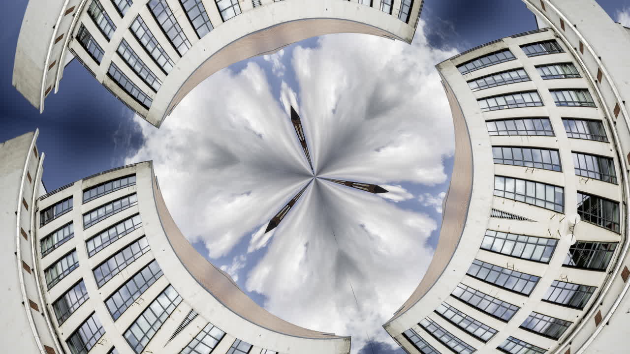 Old factory and industrial complex with passing clouds made into abstract pattern