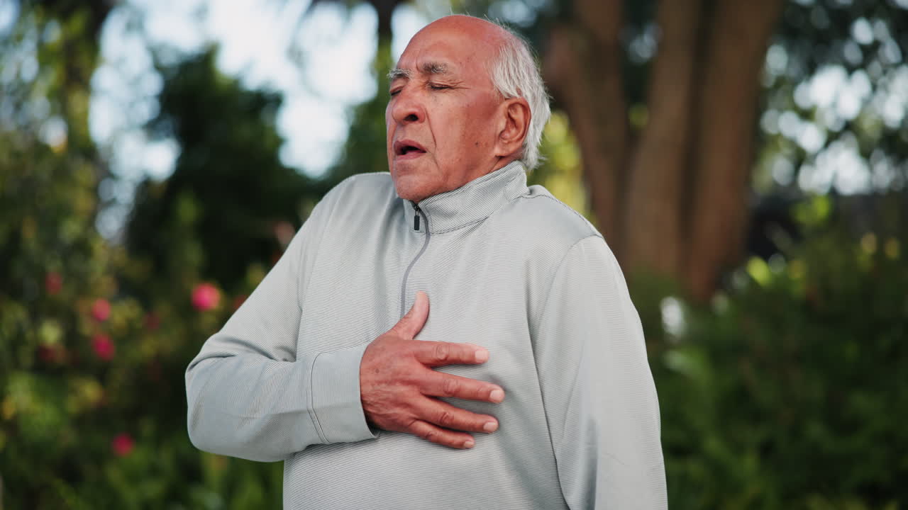 Senior man experiencing chest pain