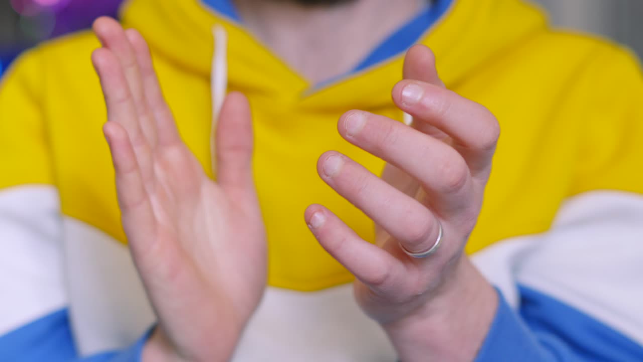 Male Person Raising Hands and Clapping in Slow Motion. Applauding Either Genuinely Or Sarcastically Giving Seal of Approval to an Action.
