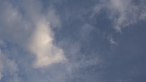 cloudscape time lapse, fluffy clouds moving in the sky