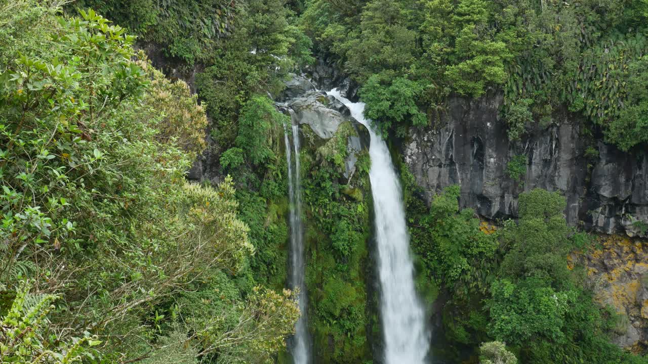 remote waterfall flow into massive gorge