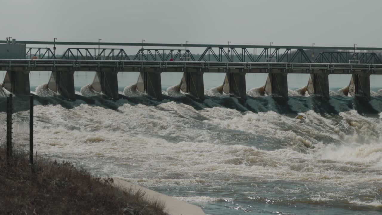 Water rushing through the levee of the Hydro Electric Dam on the Ottawa River at ChaudiÃ¨re Island in downtown Ottawa, Canada