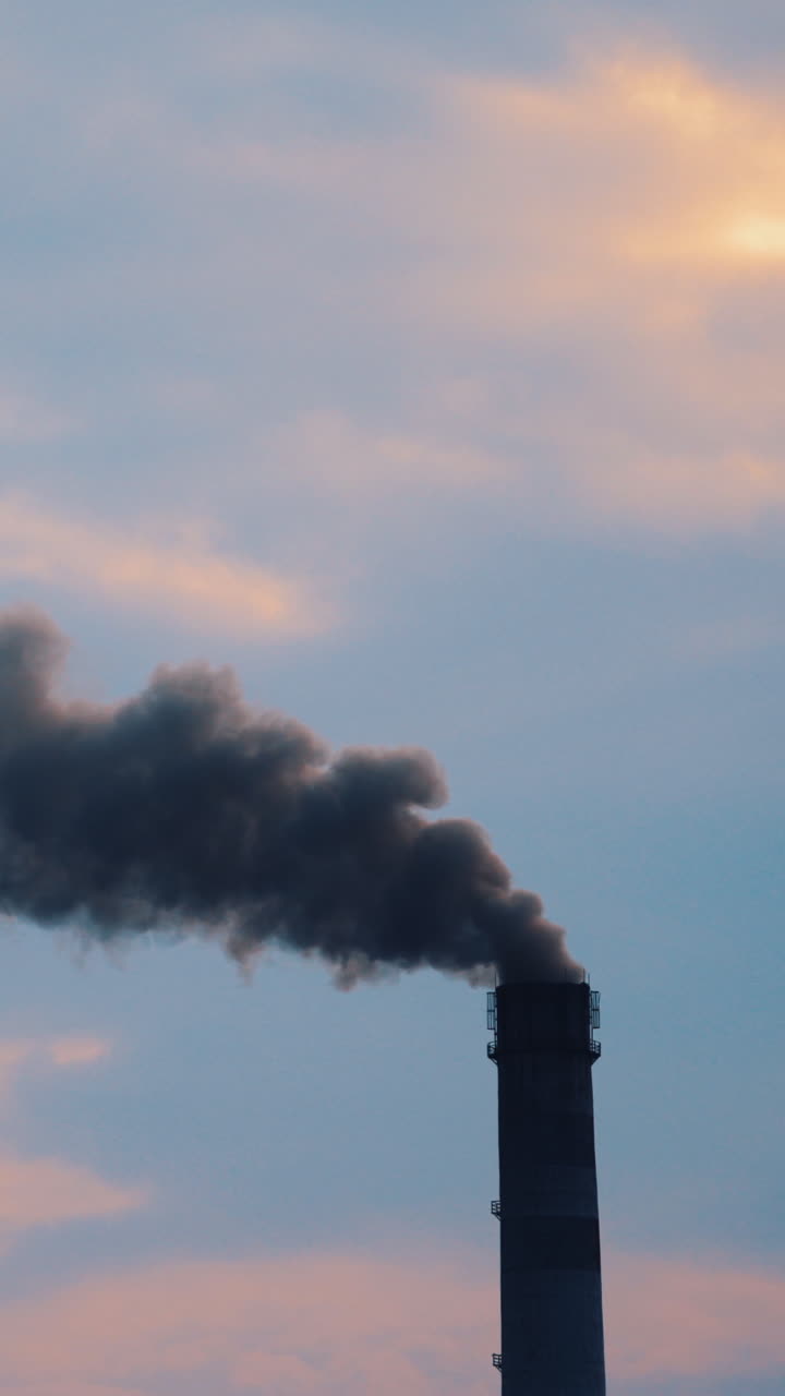 Smoke from Chimney at Sunset