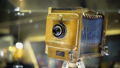 close-view-old-vintage-yellow-wooden-photo-camera