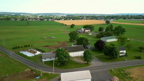 Aerial-drone-video-of-agriculture-farmland-during-sunset