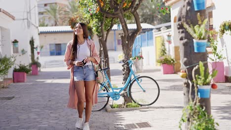 woman taking photos in a charming european city