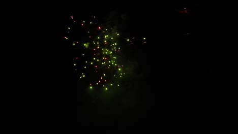 The-start-of-the-fireworks-display-with-a-single-firework-being-shot-into-the-night-sky