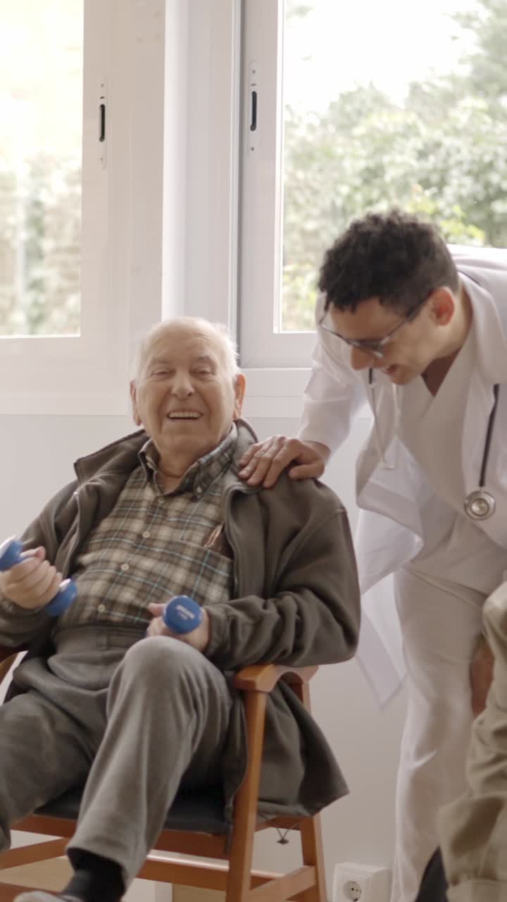 Physiotherapist doctor talking and laughing with a senior resident