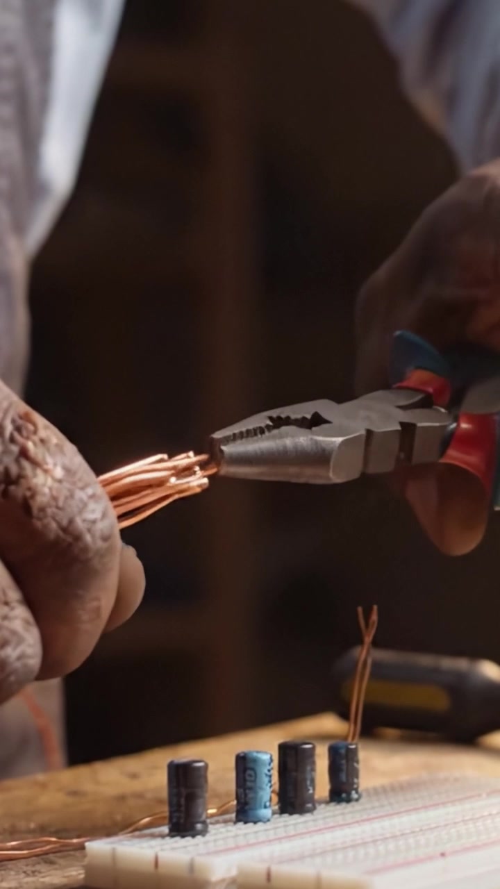 Close-up Exploration of Electrical Components and Wiring Techniques in a Hands-On Circuit Assembly Project