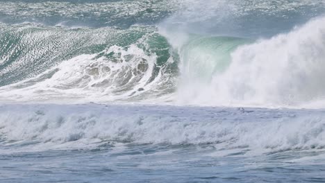 powerful waves crashing at kirra beach during cyclone alfred conditions