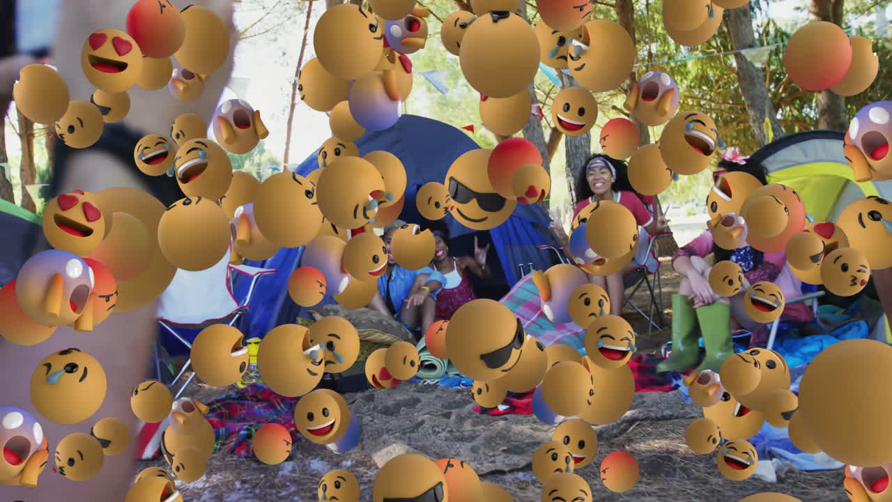 Camping in forest, people surrounded by floating emoji faces, creating animation