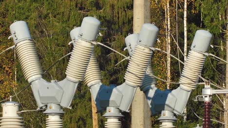 Power-lines-with-sun-rays-on-blue-sky