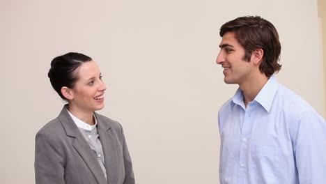 two job applicants talking together