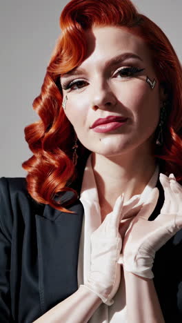 elegant woman with red hair and retro glamour