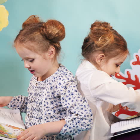 children girlfriends reading book education togetherness studio portrait square video