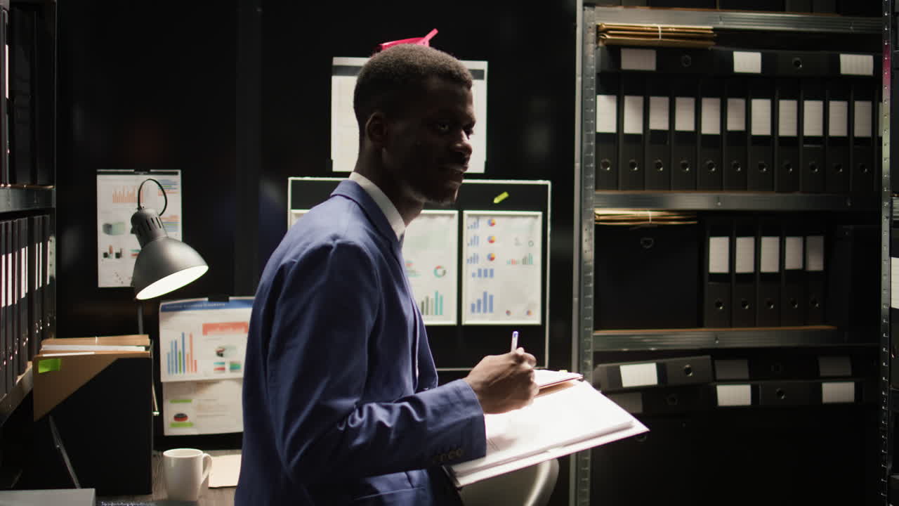 Man working in an office archive room