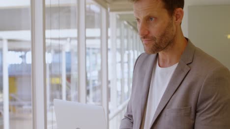 businessman using laptop in office 4k