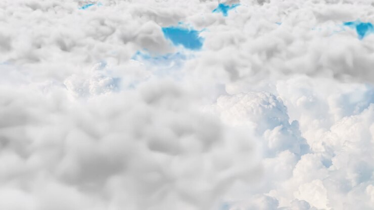 Flying through white clouds in a clear blue sky. Cloudscape of white cumulus clouds, time lapse of blue summer sky