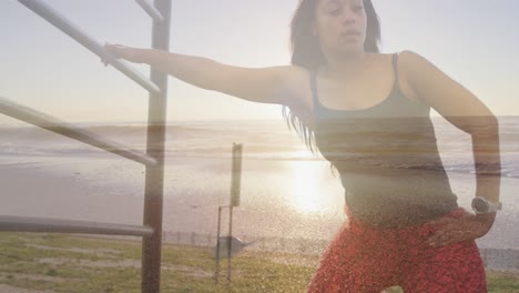 animación de paisaje marino sobre mujer afroamericana discapacitada con estiramiento de pierna artificial