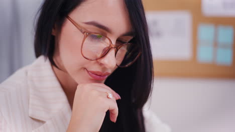 pensive woman working in office and pondering task