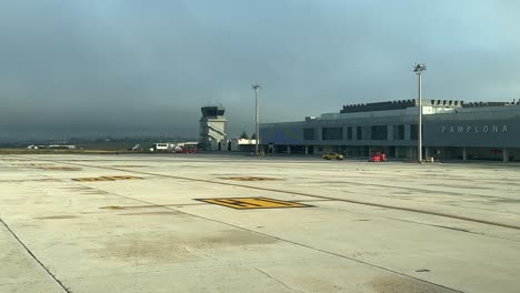 taxing on the ramp of pamplona airport, spain, after arrival to the airport as seen by the pilots early in a cold winter morning