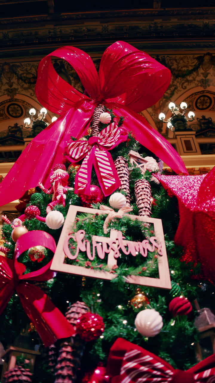 The decorated Christmas tree inside the Monte Carlo Casino in Monaco. Vertical