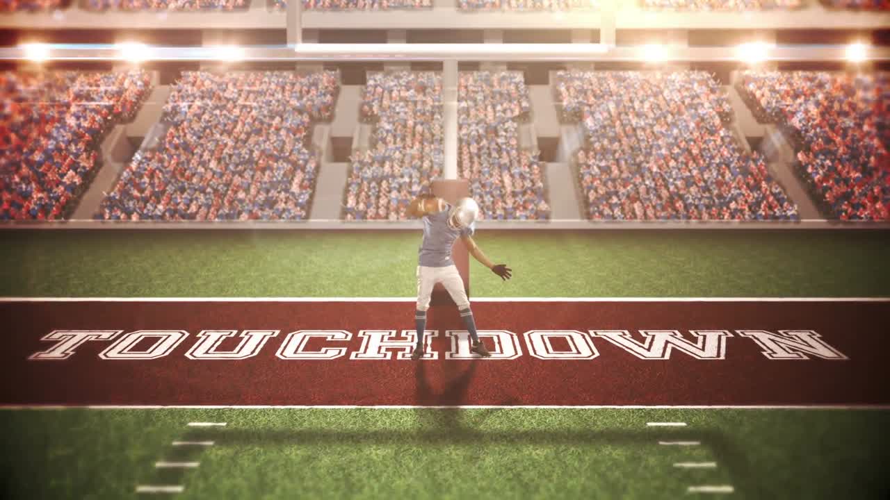 아메리칸  ⁇ 볼 선수 가 팔 을 들고 승리 하고 있다