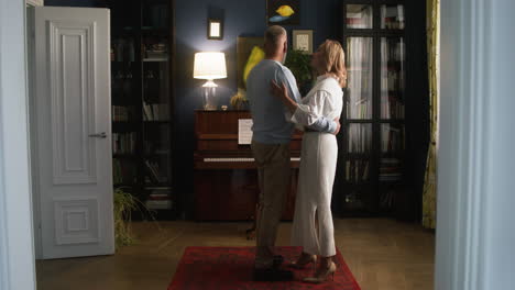 couple dancing at home