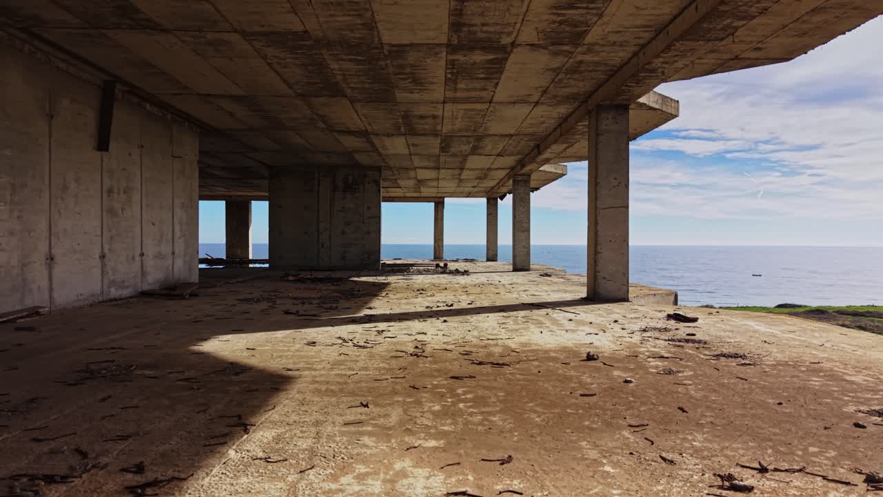 Vast empty space of a coastal building under a clear sky
