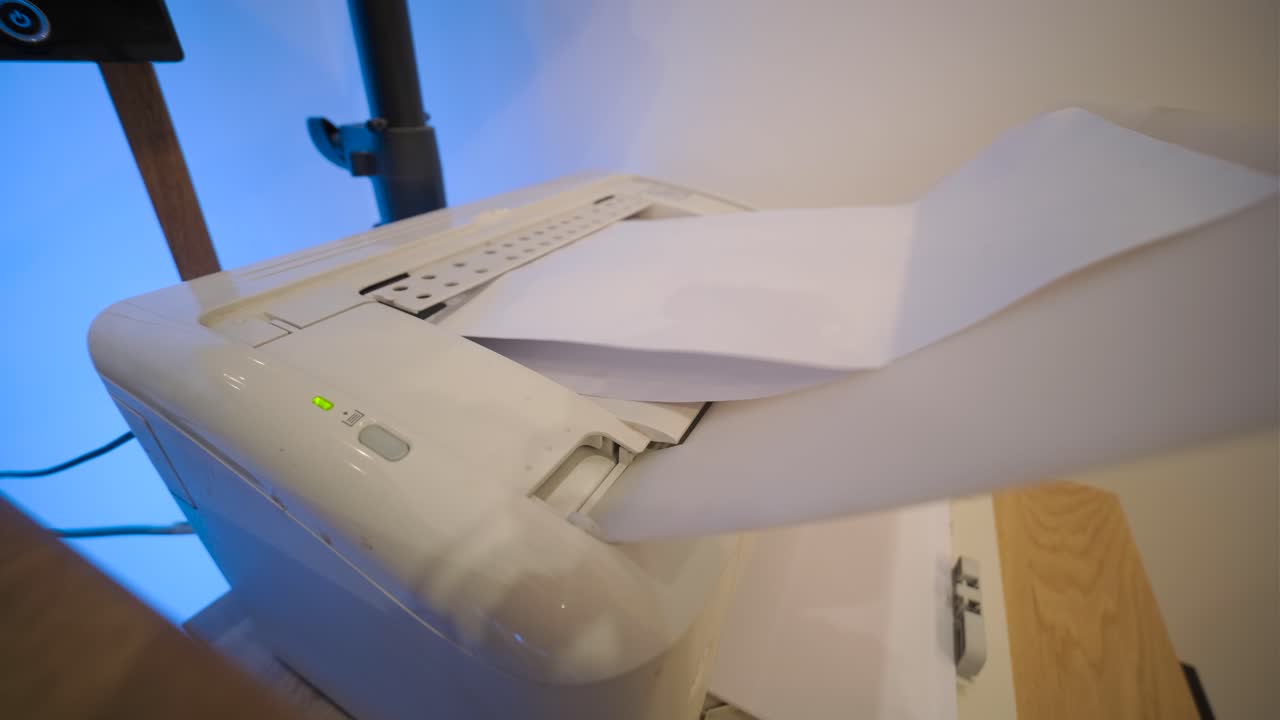 Close-up of a Printer Feeding and Processing Paper
