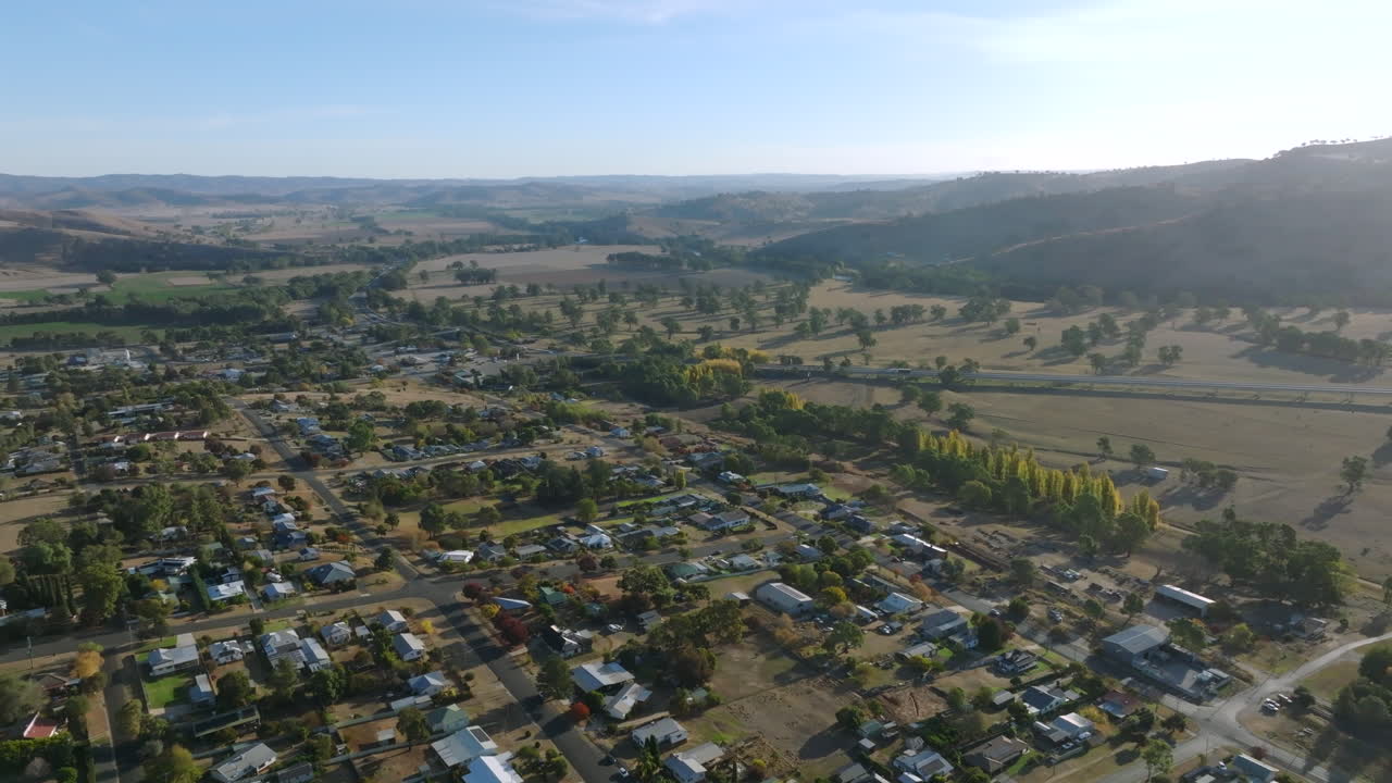 Aerial: Drone tracking backwards over Gundagai South, NSW, Australia