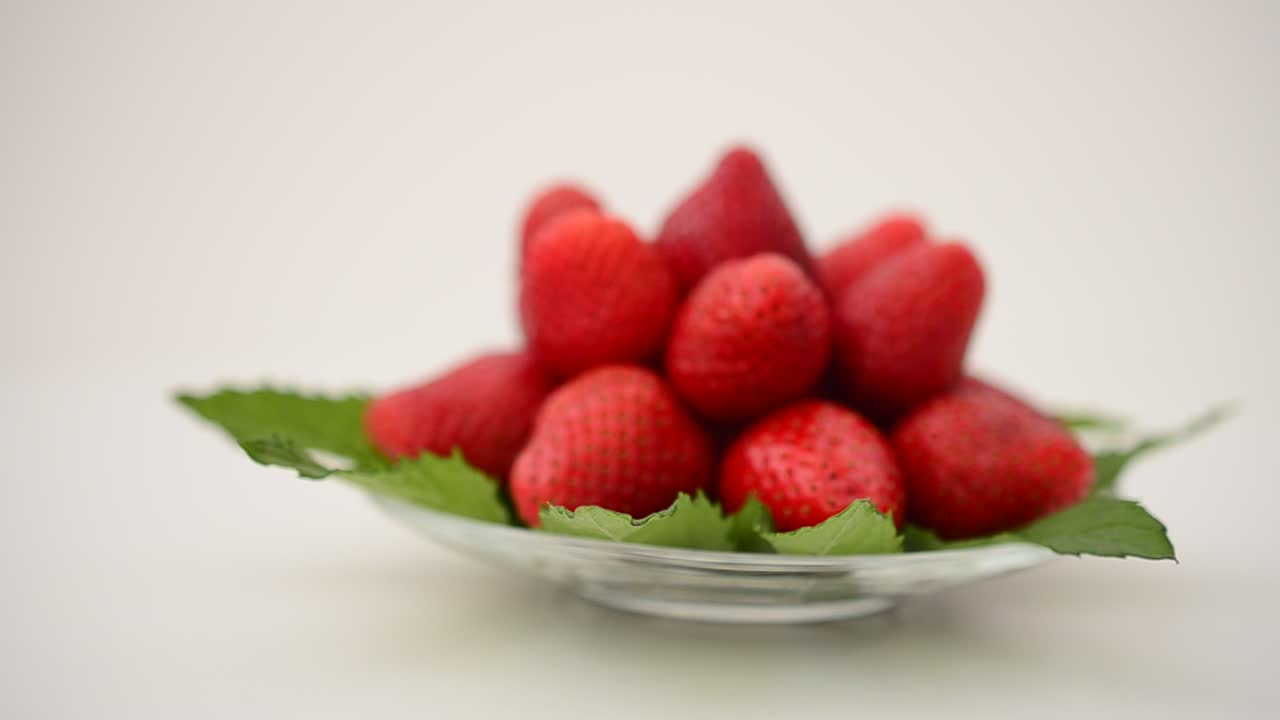 Strawberry on a white background, isolate. Shooting in the movement