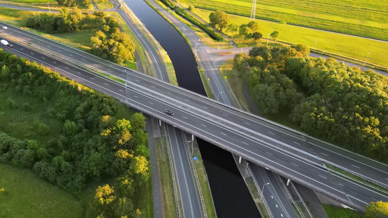Aerial View of Highway Intersection with Canal and Countryside