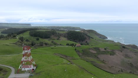 Aerial-view-of-Cape-Quejo-natural-landscape-by-Atlantic-Ocean,-Cantabria