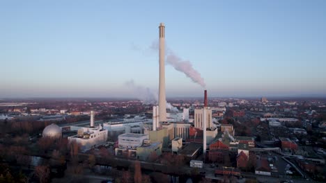 Smoke-Rising-From-Chimney-Of-Gas-And-Power-Station-During-Sunset-In-Brunswick,-Germany