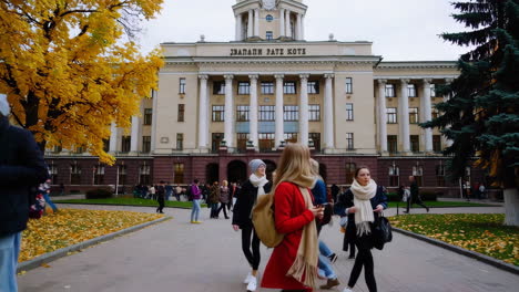 autumn day at city plaza with students
