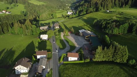 discover the charm of austrian countryside: 4k drone capture of alpine villages, majestic peaks, and scenic drives