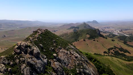 Flying-over-rocky-peaks-in-beautiful-landscape-of-California