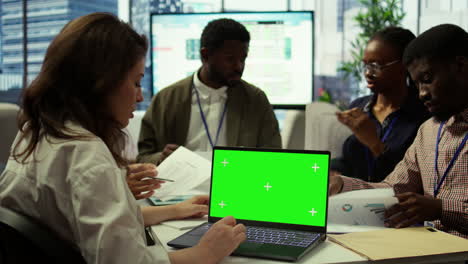investors group gathering in a meeting with chroma key screen on pc