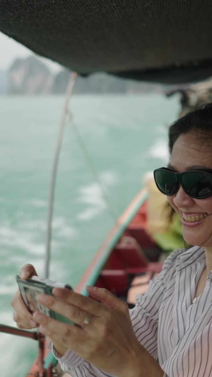 Woman on a boat with sunglasses