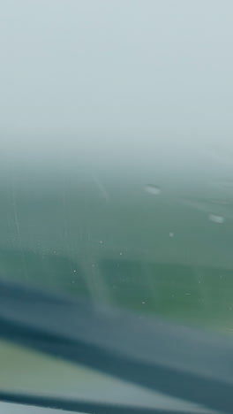 inspiring close view mechanical car wiper cleans small drops on automobile windscreen under rain