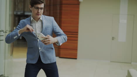 businessman walking in an office building